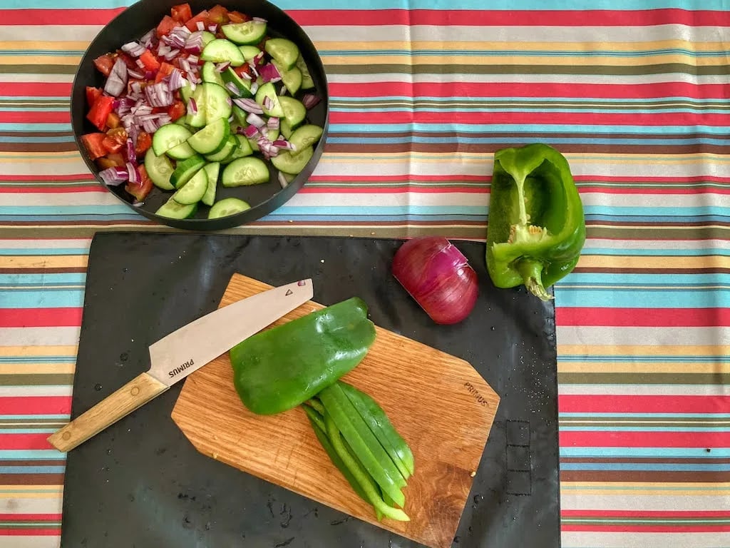 A chef's knife and cutting board set from Primus.